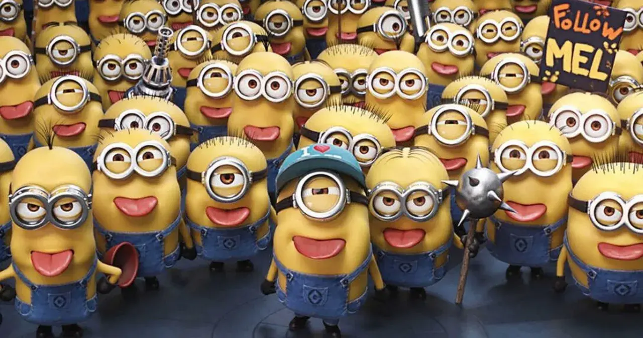Grupa wesołych, żółtych minionków postacie w niebieskich ogrodniczkach, jeden z nich trzyma tabliczkę "Follow MEL".