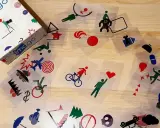 Gra Imago, zestaw kart z symbolami, idealna do ćwiczenia pamięci i kreatywności u seniorów.