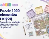 Strategie układania puzzli 1000 elementów i więcej. Kolorowe tacki z elementami, częściowo ułożony obrazek miasta.