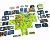 Plansza do gry **Northgard: Niezbadane Ziemie** z kartami, żetonami i figurkami.