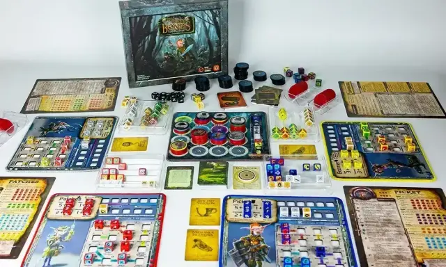 Wszystkie elementy gry planszowej "Bones" od wydawcy "CMON Games" gotowe do rozgrywki.