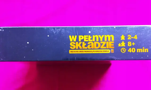 Gra planszowa "W pełnym składzie" dla 2-4 graczy od 8 lat. Czas gry: 40 minut. Wszyscy dążą do zdobycia burgera Drwala!