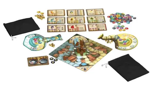 Gra planszowa "Szarlatani z Pasikurowic" BGG. Kolorowe żetony, plansza z miasteczkiem, karty składników i woreczki.